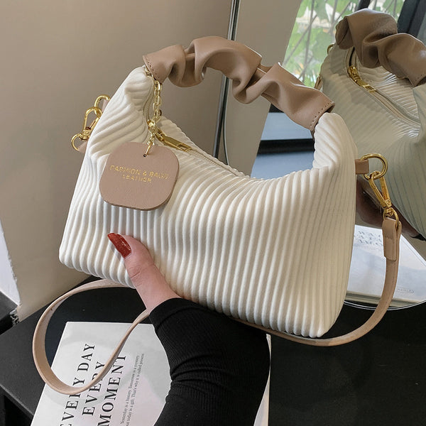 Riley Plissee-Tasche 