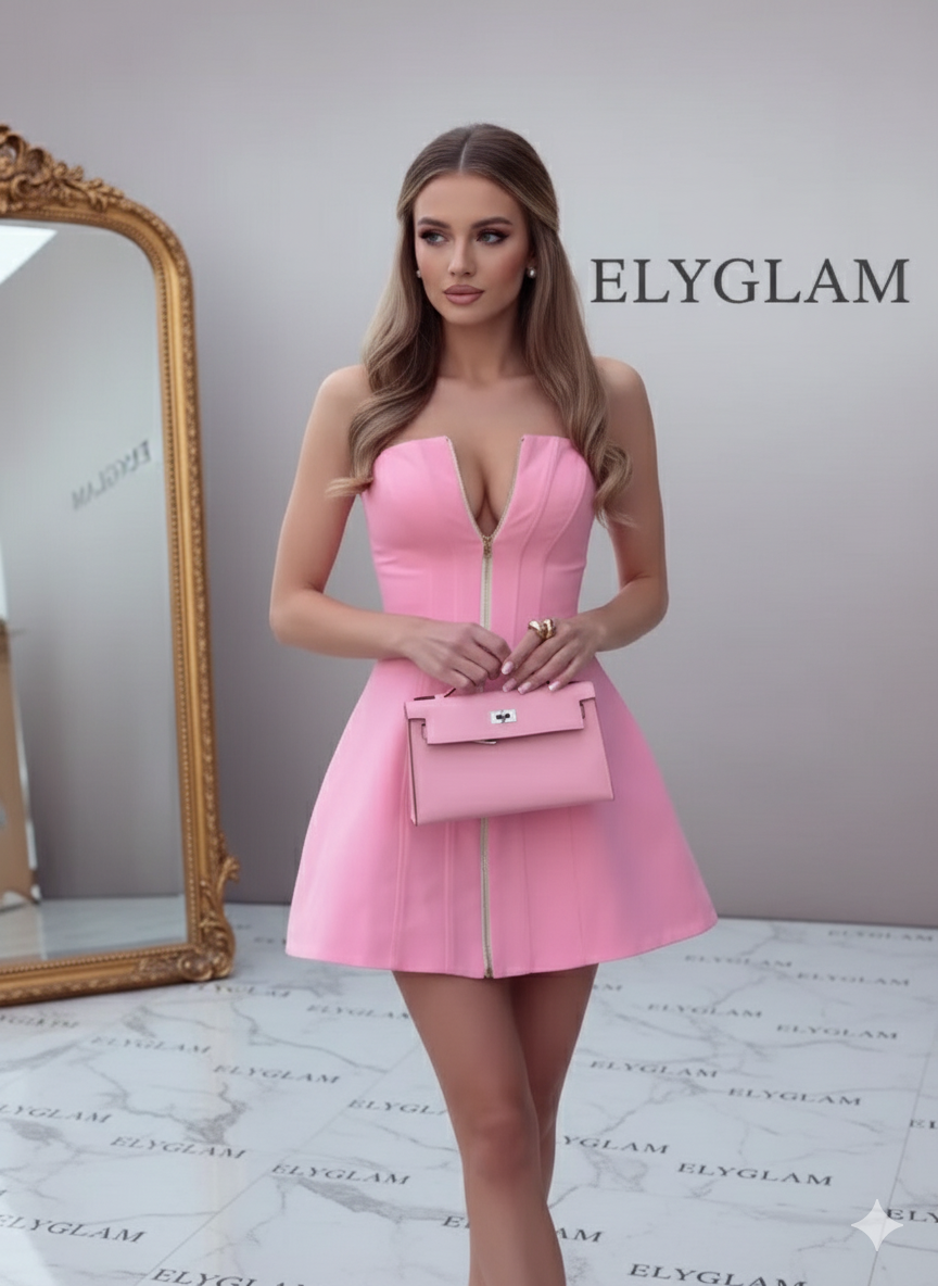 Woman in a pink dress holding a matching handbag with 'ELYGLAM' branding.