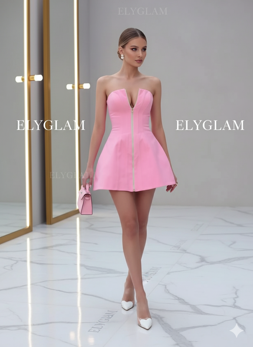 Woman wearing a pink strapless dress with 'ELYGLAM' branding in the background.