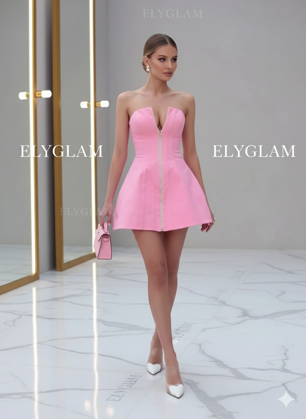 Woman wearing a pink strapless dress with 'ELYGLAM' branding in the background.